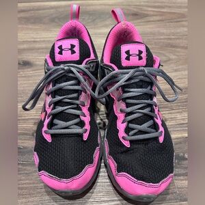 Black & pink Under Armour sneakers.